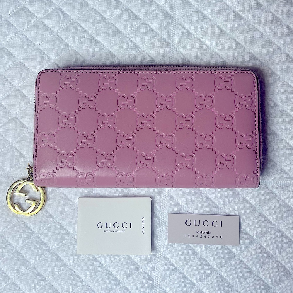SOLD Gucci Pink GG Embossed Zip Around Wallet